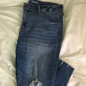 Old navy mid-rise blue jeans with distressing
